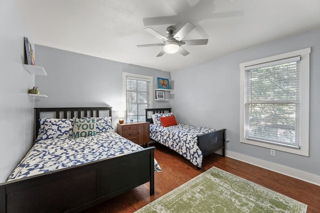 611 W Johanna St, Austin, TX 78704 - bedroom featuring wood finished floors and ceiling fan