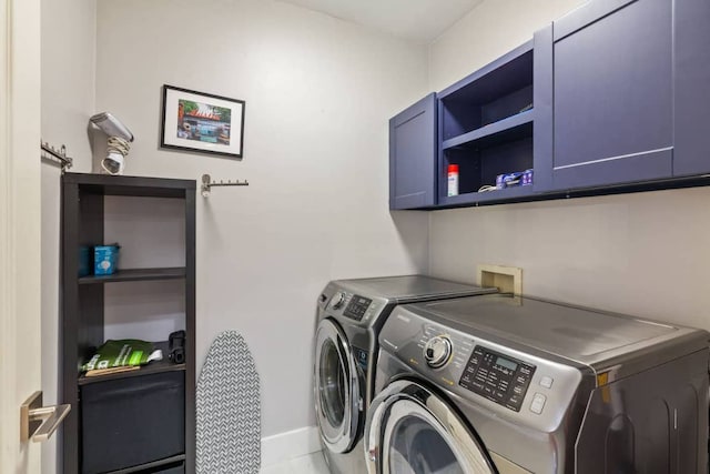 611 W Johanna St, Austin, TX 78704 - laundry area featuring cabinet space and washer and dryer