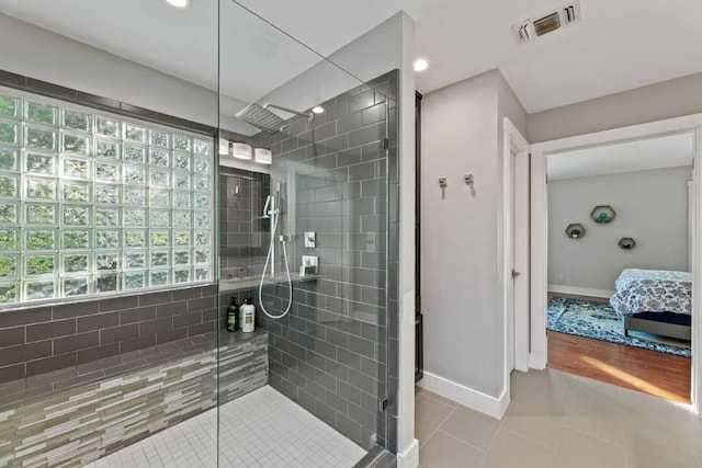 611 W Johanna St, Austin, TX 78704 - ensuite bathroom with tile patterned flooring and a stall shower