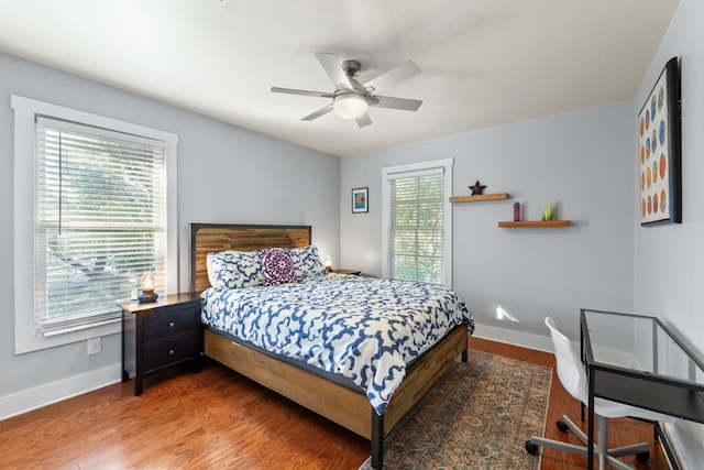 611 W Johanna St, Austin, TX 78704 - bedroom with wood finished floors and a ceiling fan