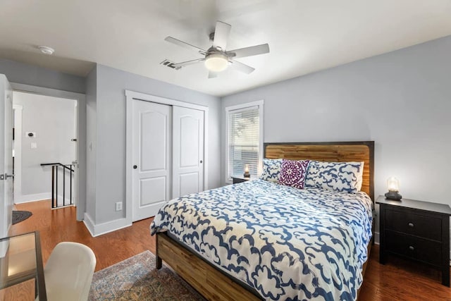 611 W Johanna St, Austin, TX 78704 - bedroom featuring a closet, wood finished floors, and a ceiling fan