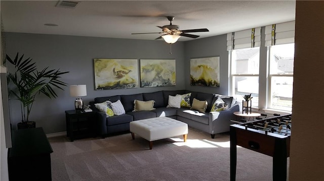 10909 Mickelson Dr, Austin, TX 78747 - living area featuring carpet and ceiling fan
