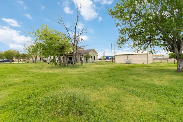 203 Grover St, Ellinger, TX 78938 - view of yard featuring an outdoor structure