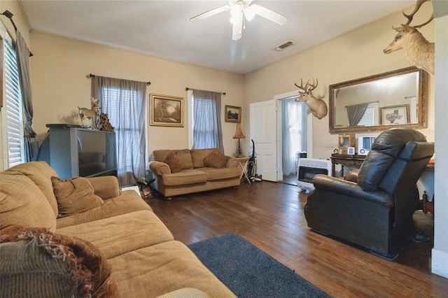 203 Grover St, Ellinger, TX 78938 - living area featuring wood finished floors and ceiling fan