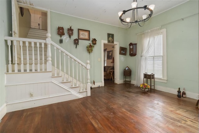 203 Grover St, Ellinger, TX 78938 - dining area featuring a chandelier, wood finished floors, and stairway