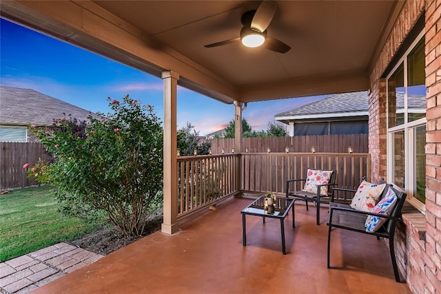 18708 Moreto Loop, Pflugerville, TX 78660 - patio terrace at dusk with a fenced backyard, ceiling fan, and a patio
