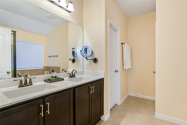 18708 Moreto Loop, Pflugerville, TX 78660 - full bathroom featuring double vanity and tile patterned floors