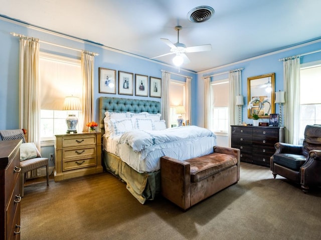 2611 Woodmont Ave, Austin, TX 78703 - bedroom with multiple windows, carpet flooring, and a ceiling fan