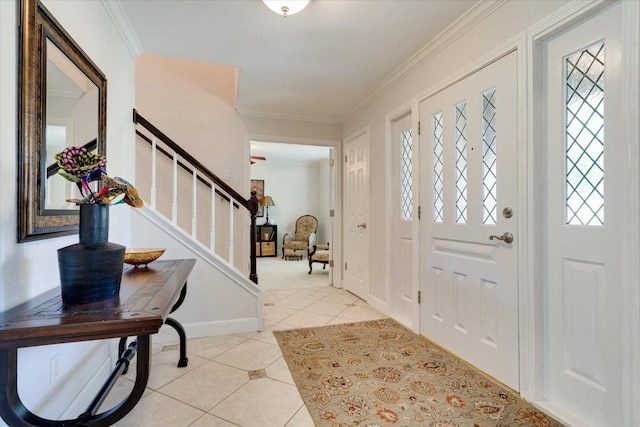 9410 Topridge Dr, Austin, TX 78750 - foyer featuring crown molding, light tile patterned floors, and stairs