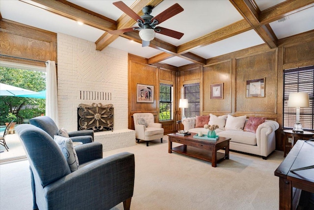 9410 Topridge Dr, Austin, TX 78750 - living area featuring coffered ceiling, beamed ceiling, light carpet, ceiling fan, and wood walls