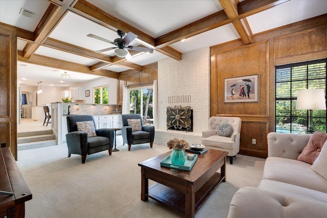 9410 Topridge Dr, Austin, TX 78750 - living area featuring light carpet, coffered ceiling, healthy amount of natural light, beam ceiling, and a ceiling fan