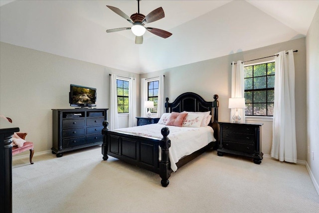 9410 Topridge Dr, Austin, TX 78750 - bedroom featuring light colored carpet, multiple windows, lofted ceiling, and ceiling fan
