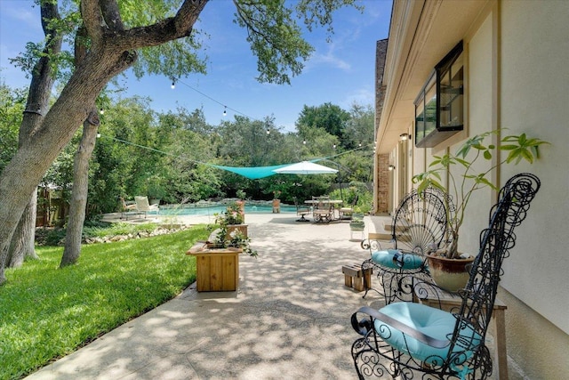 9410 Topridge Dr, Austin, TX 78750 - view of patio with an outdoor pool