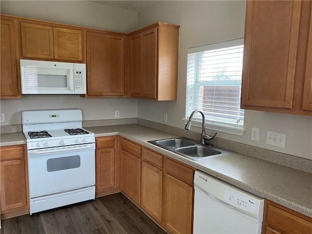 2700 Saddle Blanket Pl, Leander, TX 78641 - kitchen with white appliances, dark wood-type flooring, and light countertops
