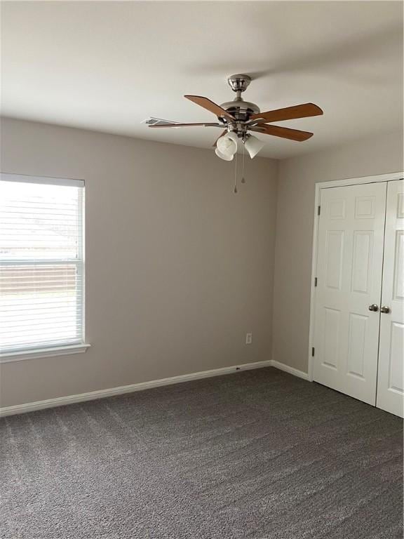 2700 Saddle Blanket Pl, Leander, TX 78641 - unfurnished room with a ceiling fan and dark colored carpet