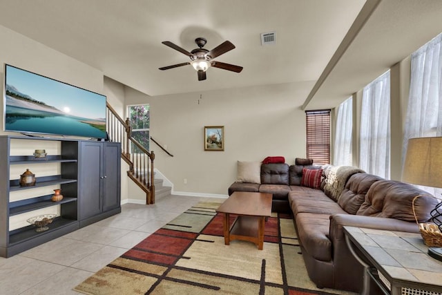 201 Trestle Tree, San Marcos, TX 78666 - living area with a ceiling fan, light tile patterned floors, and stairs