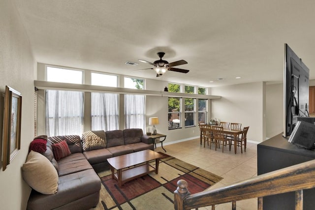 201 Trestle Tree, San Marcos, TX 78666 - living room with a ceiling fan and light tile patterned floors
