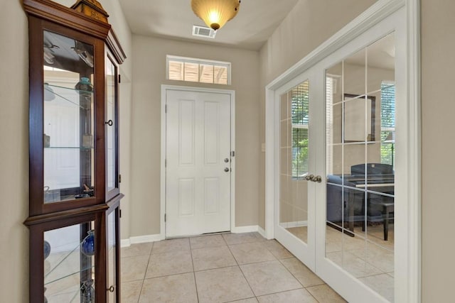 201 Trestle Tree, San Marcos, TX 78666 - entryway with french doors and light tile patterned floors