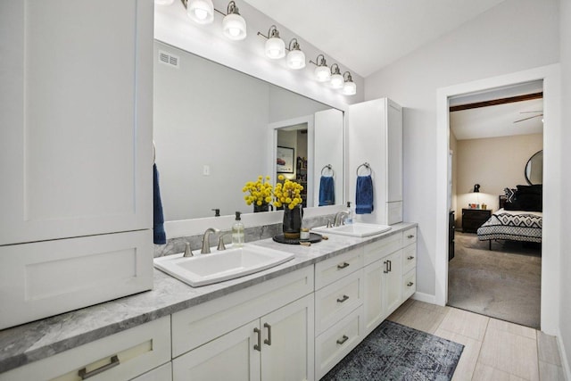 9100 Bill Hickcock Pass, Austin, TX 78748 - ensuite bathroom featuring double vanity