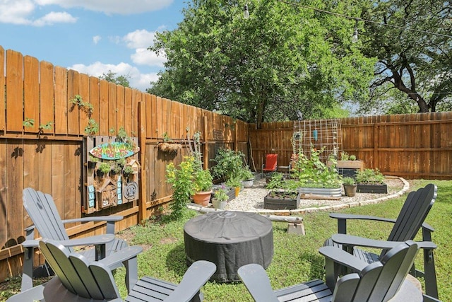 9100 Bill Hickcock Pass, Austin, TX 78748 - fenced backyard featuring a garden
