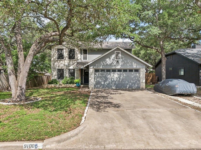 9100 Bill Hickcock Pass, Austin, TX 78748 - view of front of home with a garage and concrete driveway