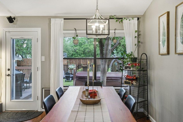 9100 Bill Hickcock Pass, Austin, TX 78748 - dining area with a chandelier and baseboards
