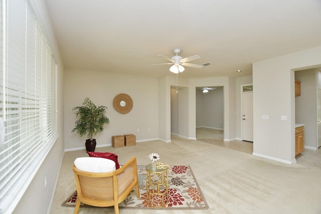 101 Ranch House Cv, Georgetown, TX 78633 - living room featuring a ceiling fan and light colored carpet