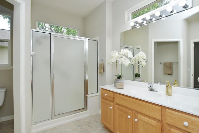 101 Ranch House Cv, Georgetown, TX 78633 - full bath with a stall shower, vanity, and healthy amount of natural light