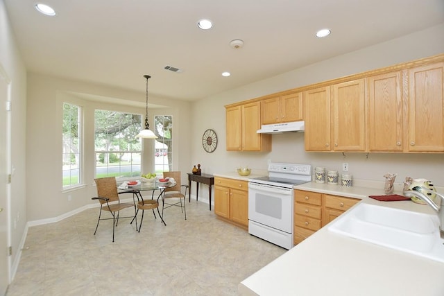 101 Ranch House Cv, Georgetown, TX 78633 - kitchen featuring white electric range, under cabinet range hood, light countertops, recessed lighting, and pendant lighting