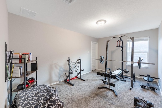 1805 Bogata Ln, Leander, TX 78641 - exercise area with carpet and baseboards