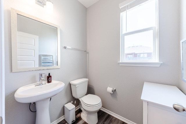 1805 Bogata Ln, Leander, TX 78641 - half bath with wood finished floors and toilet