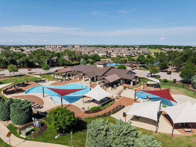 1805 Bogata Ln, Leander, TX 78641 - aerial perspective of suburban area with a pool