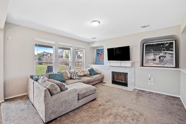 1805 Bogata Ln, Leander, TX 78641 - living area featuring a fireplace and carpet floors