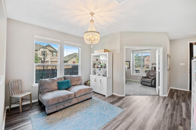 1805 Bogata Ln, Leander, TX 78641 - living area with wood finished floors and a chandelier