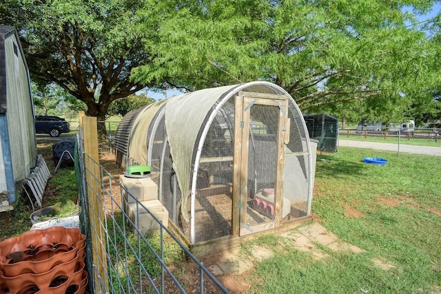 569 Mcallister Rd, Bastrop, TX 78602 - view of poultry coop with view of wooded area