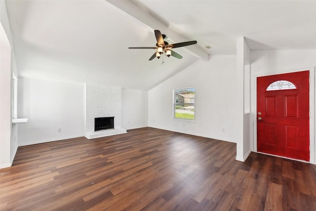 3810 Leafield Dr, Austin, TX 78749 - unfurnished living room with ceiling fan, dark wood-type flooring, and a brick fireplace