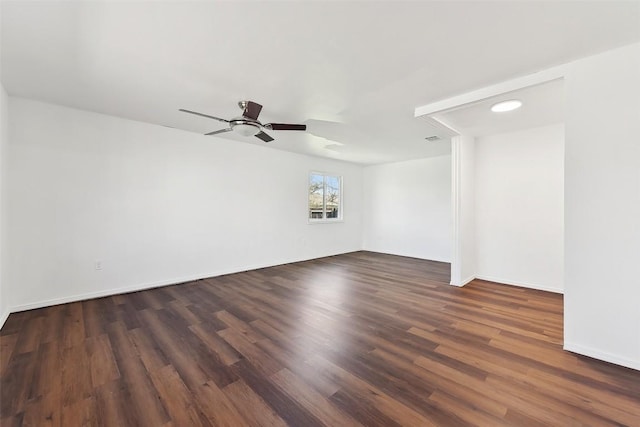 3810 Leafield Dr, Austin, TX 78749 - empty room featuring a ceiling fan and dark wood-type flooring