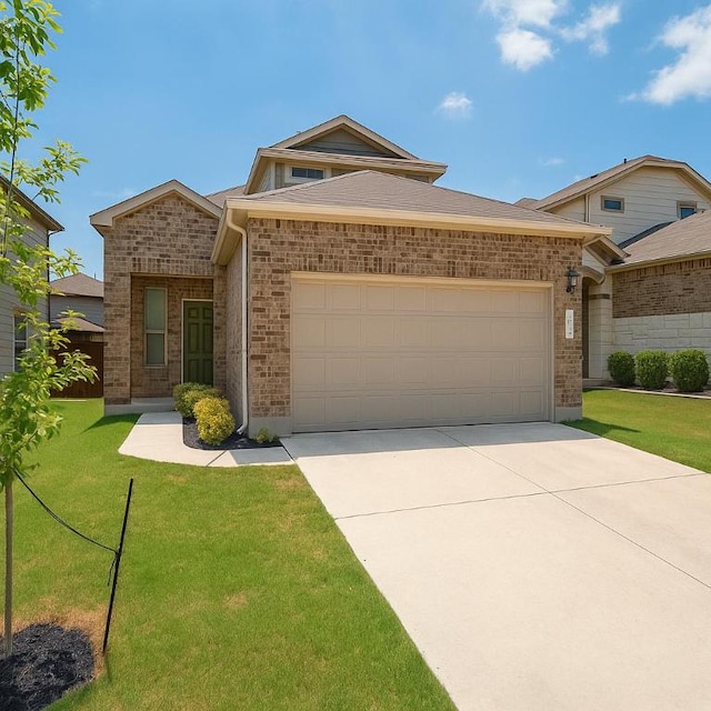 16021 Remington Reserve Way, Austin, TX 78728 - view of front of house with a garage, concrete driveway, a front yard, and brick siding