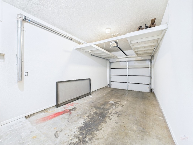 1501 Barton Springs Rd Unit 222, Austin, TX 78704 - garage featuring baseboards and a garage door opener