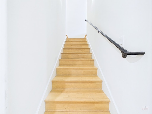 1501 Barton Springs Rd Unit 222, Austin, TX 78704 - stairs with wood finished floors and baseboards