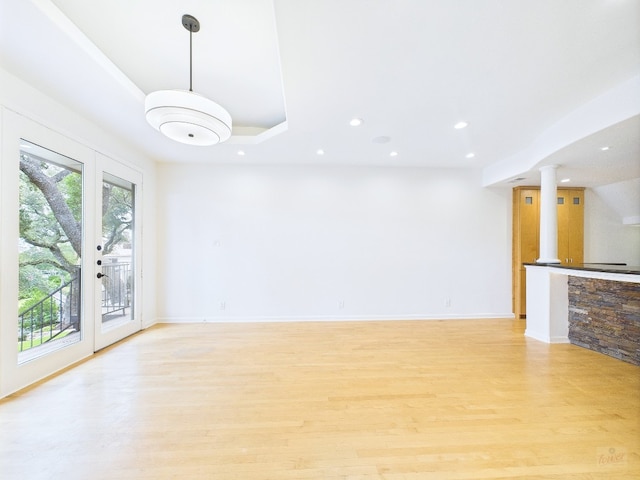 1501 Barton Springs Rd Unit 222, Austin, TX 78704 - unfurnished living room featuring recessed lighting and light wood-type flooring
