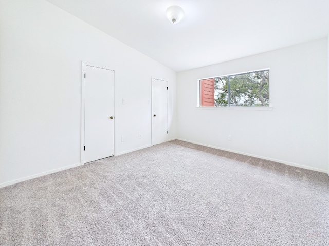 1501 Barton Springs Rd Unit 222, Austin, TX 78704 - unfurnished bedroom featuring carpet floors and baseboards