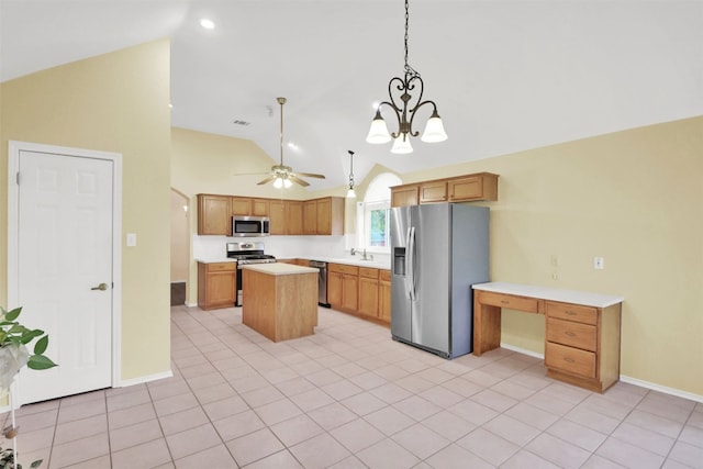 606 Dundalk Bay Cv, Pflugerville, TX 78660 - kitchen with stainless steel appliances, a center island, light countertops, a ceiling fan, and decorative light fixtures
