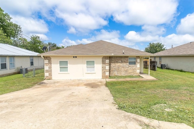 706 Brown St, Lampasas, TX 76550 - single story home with a gate, roof with shingles, brick siding, and concrete driveway
