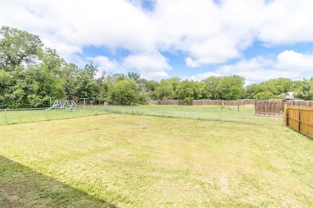 706 Brown St, Lampasas, TX 76550 - fenced backyard with a playground