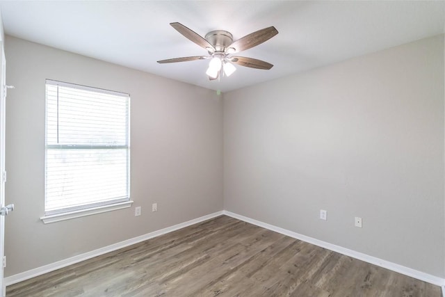 706 Brown St, Lampasas, TX 76550 - spare room with wood finished floors and ceiling fan