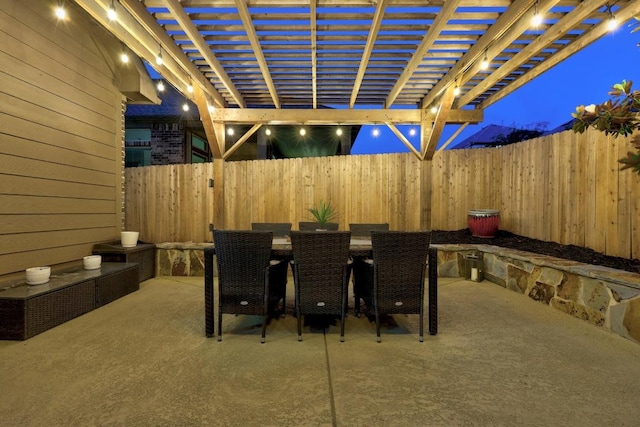 100 Crystal Cv, Round Rock, TX 78664 - patio at twilight featuring a patio, a pergola, and outdoor dining area