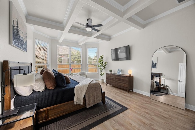100 Crystal Cv, Round Rock, TX 78664 - bedroom featuring beam ceiling, light wood-style flooring, arched walkways, coffered ceiling, and crown molding
