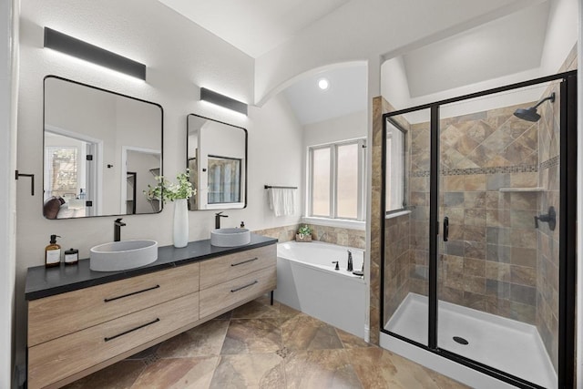 100 Crystal Cv, Round Rock, TX 78664 - full bath with a bath, double vanity, plenty of natural light, a stall shower, and lofted ceiling