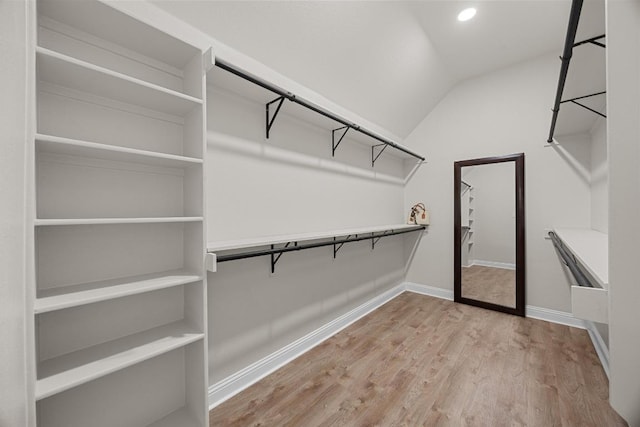 100 Crystal Cv, Round Rock, TX 78664 - spacious closet featuring wood finished floors and vaulted ceiling